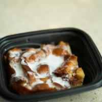 Bread Pudding - Pan · Our signature bread pudding made with our freshly-made yeast rolls.  Topped with drizzle of ...