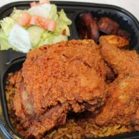 Fried Chicken With Rice And Beans · baterd and friend chicken with rice and beans sweet plantains and salad
