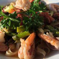 Shrimp Andrea  · sautéed jumbo shrimp with garlic, diced prosciutto, crushed plum tomatoes, scallions, aspara...