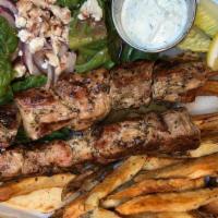 Souvlaki Plate · Two skewers of marinated grilled chicken or pork, salad, feta, hand cut oregano fries, and t...