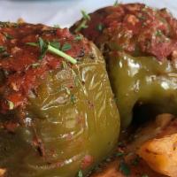 Stuffed Peppers · Green peppers stuffed with ground beef and rice, oven roasted potatoes.