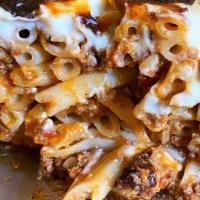 Pastitsio · Layers of tubed pasta and meat sauce and bechamel.