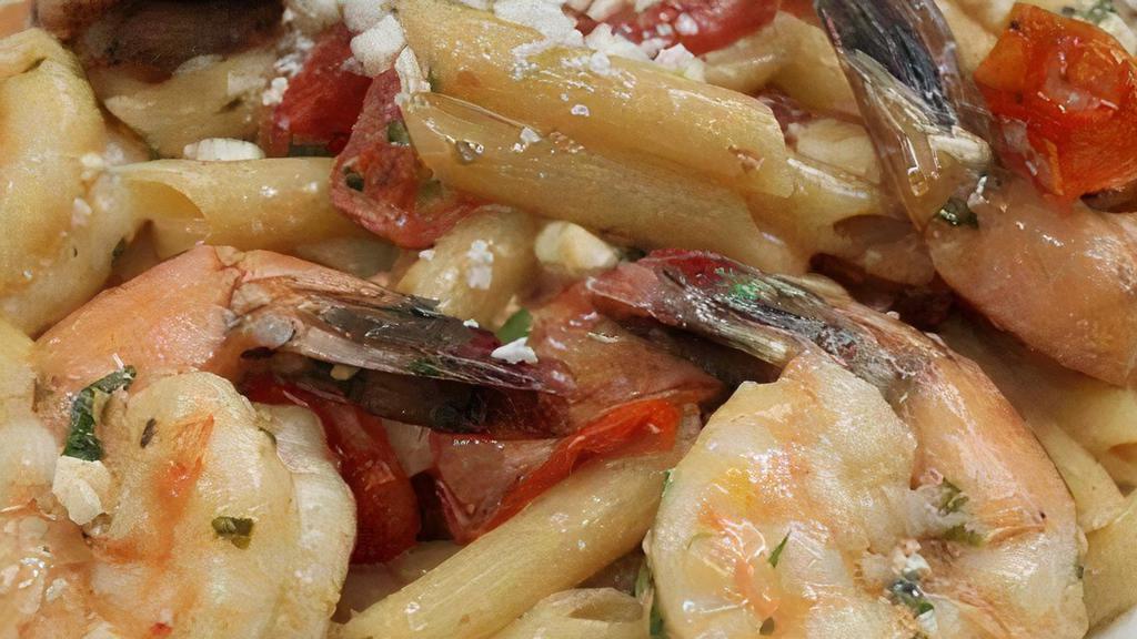 Shrimp Santorini · Six jumbo white shrimp, garlic, shallots, cherry tomatoes, and feta cheese over pasta.