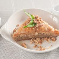 Baklava · Layers of crispy phyllo and walnuts, simple syrup.