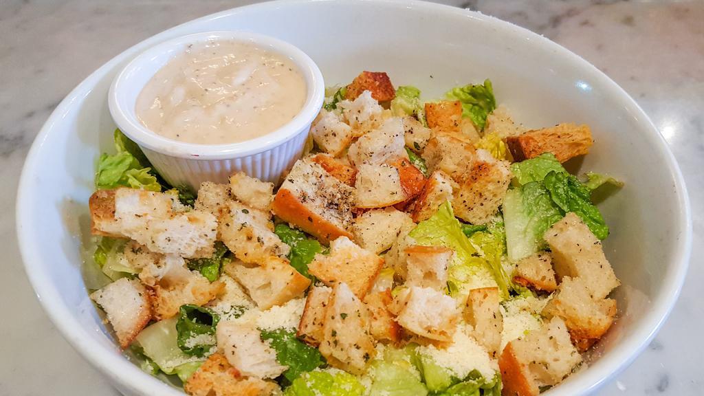 Caesar Salad · Romaine hearts, ciabatta croutons, shaved Parmigiano & Caesar dressing with a choice of proteins.