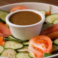 Stagione Salad · Mixed greens, tomatoes, carrots & cucumbers with balsamic dressing