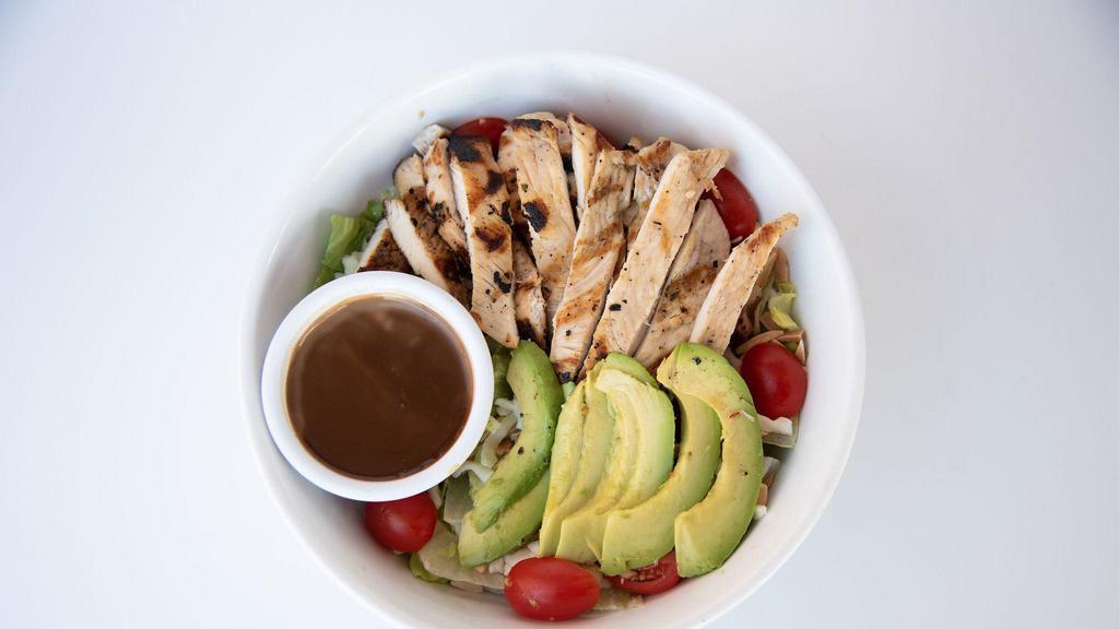 Avocado Salad · Grilled chicken, iceberg lettuce, shredded mozzarella, avocado, toasted almonds & . cherry tomatoes with balsamic dressing.