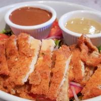 Sal Salad · Chicken cutlet, mixed greens, red onions & tomatoes with roasted garlic vinaigrette