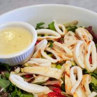 Insalata Di Calamari · Grilled calamari, mixed greens, olives, capers, . sundried tomatoes & scallions with lime dr...