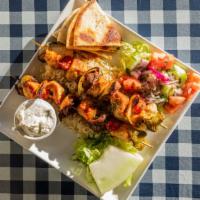 Traditional Kebobs Platter · Chicken, beef or, served over rice.