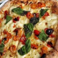 Filetti · oven dried heirloom tomato, mozzarella, garlic, fresh basil, italian evoo