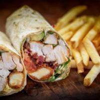 Chick N' Chedda Wrap · buffalo grilled chicken, fried cheddar cheese curds, smoked bacon, avocado, pico, mixed gree...