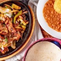 Fajita Riviera Maya (Chicken) · Protein with onions, peppers, tomato, zucchini, & mushroom; served with rice, beans, tortill...