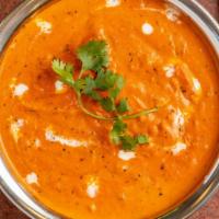 Chicken Tikka Masala · Boneless pieces of chicken marinated in yogurt and spices, cooked in the tandoor, and with t...