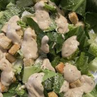 Caesar Salad · Served with romaine lettuce red & white onion green & black olives & cucumbers.