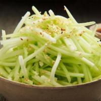 Cucumber Salad · Fresh cucumber strips with a ponzu dressing.
