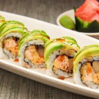 Tiger Roll · Tempura'd salmon, spicy kani, portabella, fried onion, wrapped with avocado, topped with fri...