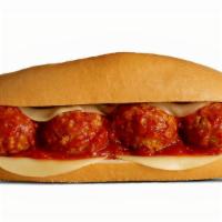 Meatball Parm Sub · Our signature meatballs on our fresh bread with pizza sauce and cheese.