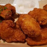 Crispy Chicken Wings 12 Pcs · Organic chicken wings, choice of salt & pepper, soy garlic, or sweet & spicy
