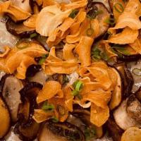 Mushroom Risotto · Assorted wild mushroom with garlic chips.
