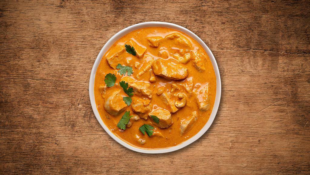 Butter Chicken Delight  · Tender chunks of char grilled tandoori chicken in a  creamy and deliciously smooth butter, tomato and cream based gravy , spiced with ginger, garlic and aromatic whole spices, served with a side of our aromatic basmati rice