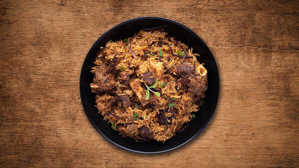 Yum Goat Biryani · Long grain premium basmati rice cooked with tender morsels of bone in goat meat in our signature biryani masala gravy