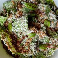 Little Gem Salad · Little Gems with roasted tomato vinaigrette, fiore sardo, caper breadcrumb, dill. 
*vegan