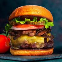 Majestic Mushroom & Swiss Cheese Burger · American beef patty cooked medium rare and topped with mushrooms, melted cheese, buttered le...