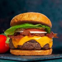 Bate Bacon Burger · American beef patty cooked medium rare and topped with melted cheese, multiple layers of cri...