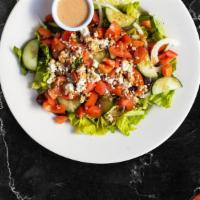 Greek Affairs Salad · (Vegetarian) Romaine lettuce, cucumbers, tomatoes, red onions, olives, and feta cheese tosse...