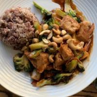 Soy Cashew Sauté · Soy cutlets, broccolini, mushrooms, bell peppers, zucchini and cashews in a kung pao sauce.
