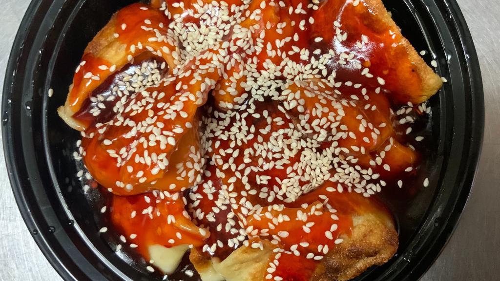 Wonton In Hot Sesame Sauce (10 Pieces) · Spicy.