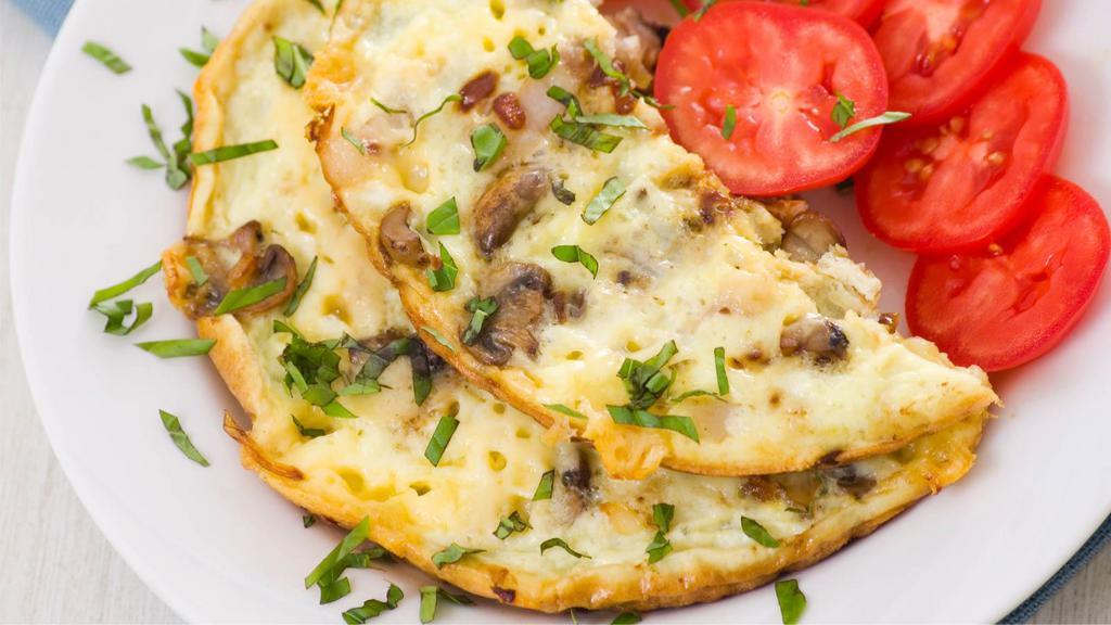 Garden Omelette · Fresh scrambled eggs served with mushrooms, crisp bell peppers, broccoli florets, tomatoes and cheddar cheese. Our platters come with fresh buttered toast, and your choice of side! Like it organic? Make your eggs organic for an additional charge.