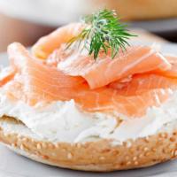 Toasted Bagel With Cream Cheese, Lox, Onion, And Tomato · Toasted bagel of your choice with cream cheese, fresh lox, tomato and onion.