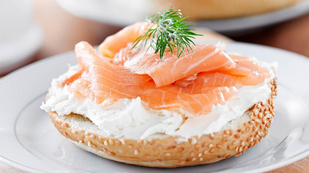 Toasted Bagel With Cream Cheese, Lox, Onion, And Tomato · Toasted bagel of your choice with cream cheese, fresh lox, tomato and onion.