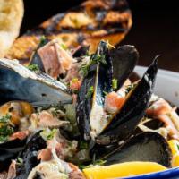 Organic Pei Mussels · traditional garlic-butter broth, grilled crusty bread