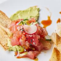 Tuna Poke* · avocado crema, ponzu, taro chips  
 *Served raw or undercooked, or contains (or may contain)...