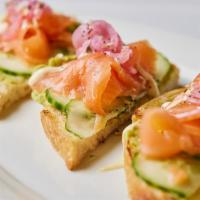 Smoked Salmon Avocado Toast* · sourdough, cucumber yogurt, red onion, cucumber, everything spice. *Served raw or undercooke...