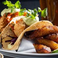 Fish Tacos · fried or blackened whitefish, pickled red cabbage, chipotle aioli, pico de gallo