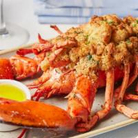 Baked Stuffed Lobster · baked with shrimp and scallop stuffing (contains gluten), choice of two sides