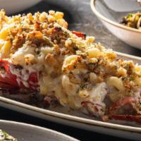 Baked Lobster Mac & Cheese · Gulf of Maine lobster, Vermont cheddar, buttered crumbs