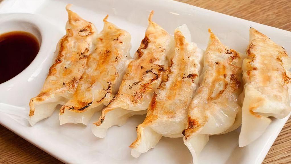 Pan Fried Pork Dumplings / 煎饺-猪肉白菜 · 8 pcs.