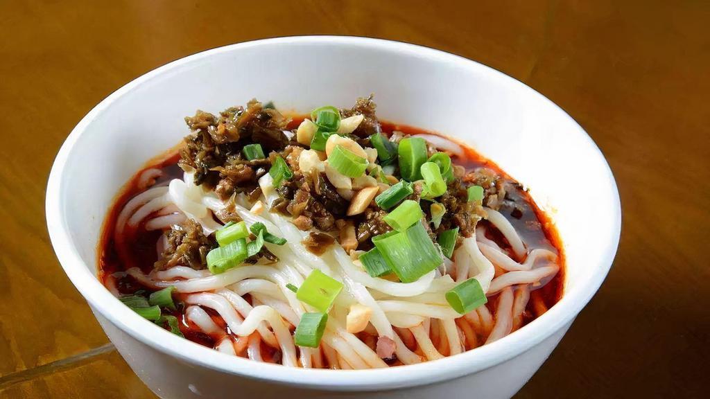 Dan-Dan Noodle / 担担面 · Spicy. Sichuan style noodles with beef meat sauce. (Please advise peanut allergy).
