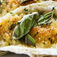 Parmesan-Garlic Charbroiled Oysters · Consuming raw or undercooked meat, poultry, seafood, shellfish or eggs may increase your ris...