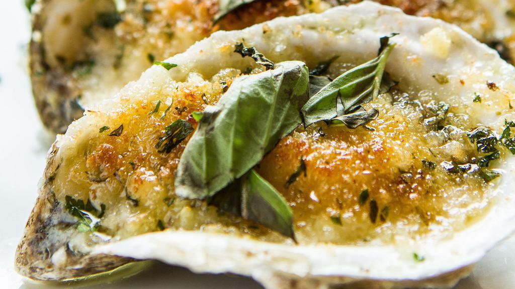 Parmesan-Garlic Charbroiled Oysters · Consuming raw or undercooked meat, poultry, seafood, shellfish or eggs may increase your risk of foodborne illness, especially if you have certain medical conditions.