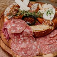 Pretz-Chuterie · jumbo bavarian salted pretzel accompanied with 3 assorted cheeses, 2 assorted charcuteries, ...