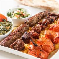 Chicken & Lamb Mixed Rice Platter · Take your taste buds on a journey with a rice platter full of juicy lamb gyro, grilled chick...