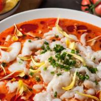 Sun Dried Tomato Soup (日照番茄鱼) · A tomato based soup topped with sliced fish fillets, fresh tomatoes, and an assortment of ve...
