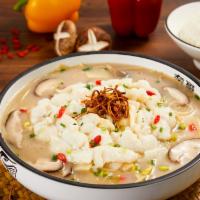 Mushroom Soup With Sliced Fish (养生菌菇高汤鱼) · For those looking who can’t handle the heat, we’ve created a mushroom stock base with an ass...