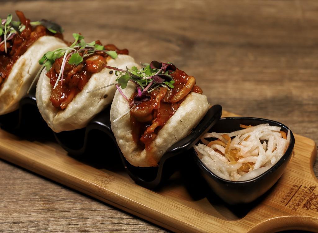 Mushroom Sliders (Vegan) · Oyster mushrooms, ginger soy BBQ sauce, signature yucca bao buns, jicama kimchi
